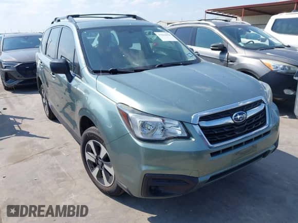 2018 Subaru Forester z VIN JF2SJABCXJH573351, wystawiony jako IAAI lot #43064050 z przebiegiem 98 209 mil mil oraz . Historia ofert i sprzedaży dostępna na DreamBid. Obrazek 1.