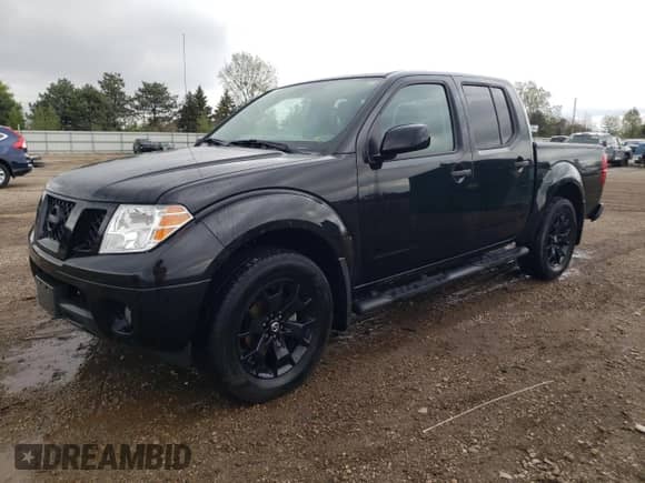 2021 Nissan Frontier Pro-4X with VIN 1N6ED0EB1MN720823, listed as a Copart auction lot 54444615 with 28,764 mi miles and Salvage title. Bid and sale history available at DreamBid. Image 1.