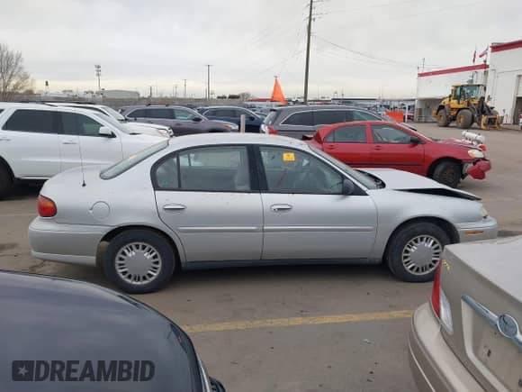 2004 Chevrolet Malibu Classic z VIN 1G1ND52FX4M501722, wystawiony jako IAAI lot #41243492 z przebiegiem 167 241 mil mil oraz . Historia ofert i sprzedaży dostępna na DreamBid. Obrazek 12.