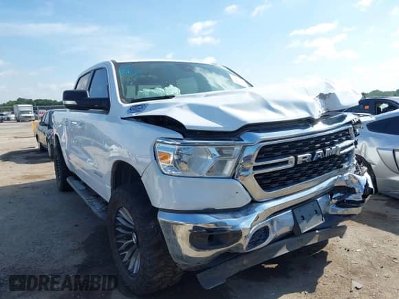 2022 Ram 1500 Big Horn z VIN 1C6RREFG9NN446003, wystawiony jako IAAI lot #42599070 z przebiegiem 61 974 mil mil oraz . Historia ofert i sprzedaży dostępna na DreamBid. Obrazek 1.