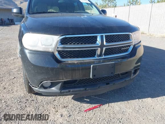 2012 Dodge Durango SXT with VIN 1C4RDJAG3CC112646, listed as a IAAI auction lot 43528808 with 227,796 mi miles and . Bid and sale history available at DreamBid. Image 6.