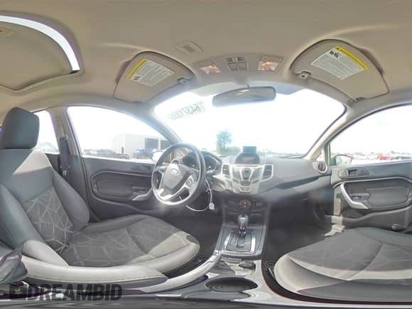 2012 Ford Fiesta SES with VIN 3FADP4FJ6CM117710, listed as a Copart auction lot 64371335 with 92,029 mi miles and Salvage title. Bid and sale history available at DreamBid. Image 14.