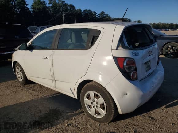 2016 Chevrolet Sonic LS with VIN 1G1JA6SH5G4174259, listed as a Copart auction lot 82685155 with 126,824 mi miles and Salvage title. Bid and sale history available at DreamBid. Image 2.