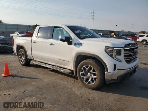 2022 GMC Sierra 1500 SLT with VIN 1GTUUDEDXNZ635464, listed as a Copart auction lot 62771555 with 48,801 mi miles and Salvage title. Bid and sale history available at DreamBid. Image 4.