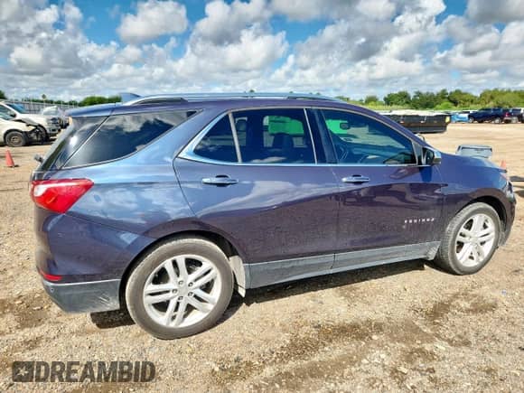 2018 Chevrolet Equinox Premier with VIN 3GNAXNEX1JS633613, listed as a Copart auction lot 80985185 with 87,243 mi miles and Salvage title. Bid and sale history available at DreamBid. Image 3.