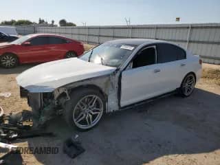 2018 BMW 5 Series M550i xDrive with VIN WBAJB9C53JB034981, listed as a Copart auction lot 65466145 with 73,314 mi miles and Salvage title. Bid and sale history available at DreamBid. Image 1.