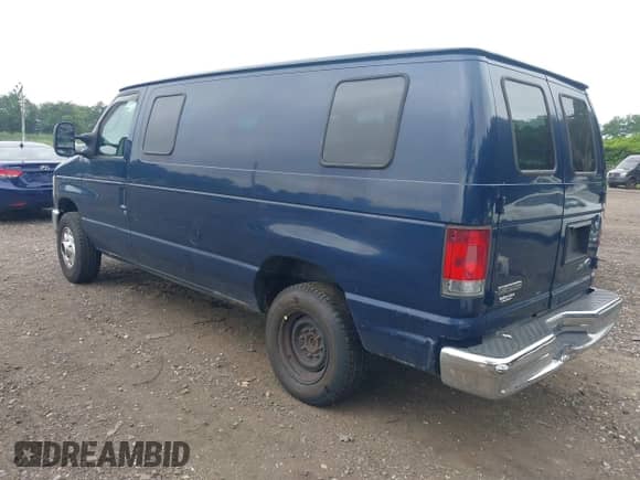 2009 Ford Econoline Cargo Commercial with VIN 1FTNE24W09DA82562, listed as a IAAI auction lot 42701633 with 214,815 mi miles and . Bid and sale history available at DreamBid. Image 3.