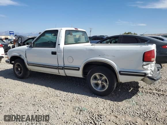 1998 Chevrolet S-10 z VIN 1GCCS1449WK242910, wystawiony jako Copart lot #65764745 z przebiegiem 134 495 mil mil oraz Szkoda całkowita • Salvage title. Historia ofert i sprzedaży dostępna na DreamBid. Obrazek 2.