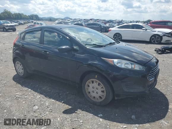 2014 Ford Fiesta S with VIN 3FADP4TJXEM221267, listed as a Copart auction lot 71096955 with 121,703 mi miles and Salvage title. Bid and sale history available at DreamBid. Image 4.