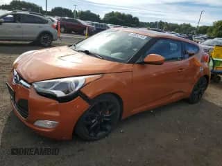 2013 Hyundai Veloster w/Black Int z VIN KMHTC6AD5DU178389, wystawiony jako Copart lot #80652785 z przebiegiem 150 305 mil mil oraz Szkoda całkowita • Salvage title. Historia ofert i sprzedaży dostępna na DreamBid. Obrazek 1.