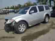 2011 Nissan Pathfinder SV with VIN 5N1AR1NB1BC633873, listed as a Copart auction lot 80796445 with 240,614 mi miles and Salvage title. Bid and sale history available at DreamBid. Image 1.