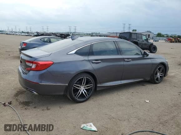 2022 Honda Accord Touring with VIN 1HGCV2F97NA012679, listed as a Copart auction lot 63695585 with 26,883 mi miles and Salvage title. Bid and sale history available at DreamBid. Image 3.