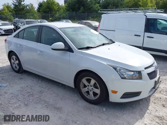 2014 Chevrolet Cruze 1LT with VIN 1G1PC5SB4E7470010, listed as a IAAI auction lot 43078287 with 118,782 mi miles and . Bid and sale history available at DreamBid. Image 1.