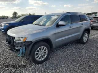 2016 Jeep Grand Cherokee Laredo with VIN 1C4RJFAG6GC470013, listed as a Copart auction lot 84029855 with 134,661 mi miles and Salvage title. Bid and sale history available at DreamBid. Image 1.