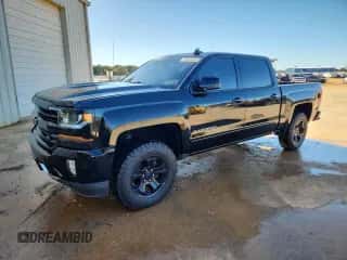 2018 Chevrolet Silverado 1500 LT z VIN 3GCUKREC9JG247985, wystawiony jako Copart lot #89700785 z przebiegiem 176 054 mil mil oraz Czysty tytuł • Clean title. Historia ofert i sprzedaży dostępna na DreamBid. Obrazek 1.