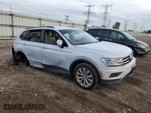 2018 Volkswagen Tiguan S with VIN 3VV1B7AX4JM071186, listed as a Copart auction lot 68552955 with 117,126 mi miles and Salvage title. Bid and sale history available at DreamBid. Image 4.