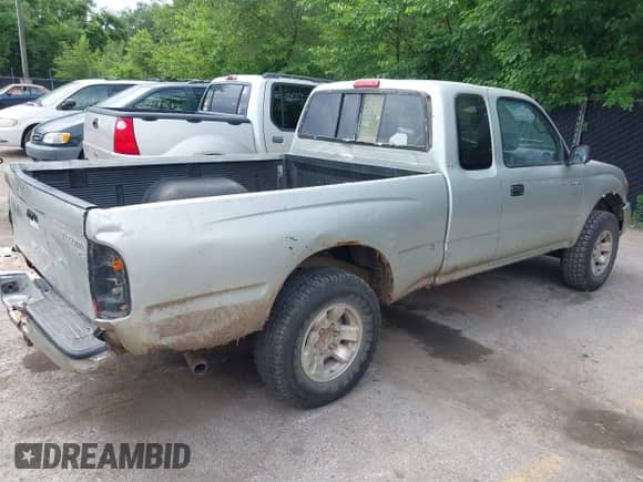 2000 Toyota Tacoma with VIN 4TAWM72N7YZ646025, listed as a IAAI auction lot 42515848 with 156,551 mi miles and . Bid and sale history available at DreamBid. Image 4.