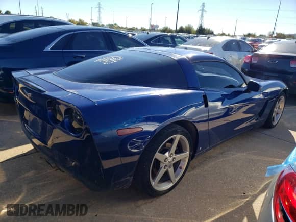 2006 Chevrolet Corvette with VIN 1G1YY26U965130817, listed as a Copart auction lot 76907154 with 98,280 mi miles and Salvage title. Bid and sale history available at DreamBid. Image 3.