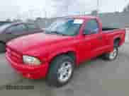 1999 Dodge Dakota SLT with VIN 1B7GL26Z5XS217114, listed as a IAAI auction lot 43418147 with 145,280 mi miles and . Bid and sale history available at DreamBid. Image 2.