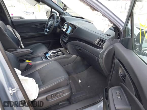 2023 Honda Passport Elite z VIN 5FNYF8H03PB000039, wystawiony jako IAAI lot #40593339 z przebiegiem 33 697 mil mil oraz . Historia ofert i sprzedaży dostępna na DreamBid. Obrazek 5.