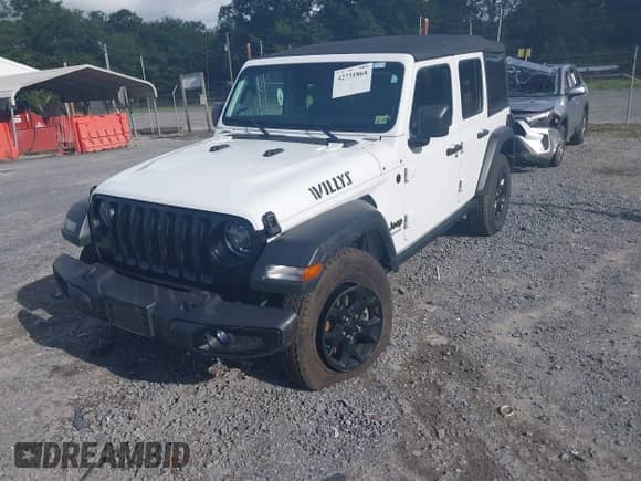 2021 Jeep Wrangler Unlimited Willys with VIN 1C4HJXDM8MW577187, listed as a IAAI auction lot 42731864 with 71,256 mi miles and . Bid and sale history available at DreamBid. Image 2.