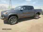 2016 Toyota Tacoma Limited с VIN 3TMGZ5AN4GM002613, выставлен на аукционе Copart как лот 67453675 с пробегом 70 032 миль миль и Списание • Salvage title. История ставок и продаж доступна на DreamBid. Изображение 1.