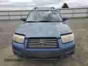 2007 Subaru Forester X with VIN JF1SG65627H721457, listed as a Copart auction lot 69364895 with 214,669 mi miles and Salvage title. Bid and sale history available at DreamBid. Image 5.