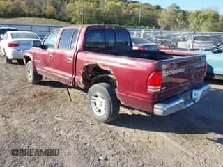2002 Dodge Dakota SLT z VIN 1B7HG48N82S552357, wystawiony jako IAAI lot #43498260 z przebiegiem 192 220 mil mil oraz . Historia ofert i sprzedaży dostępna na DreamBid. Obrazek 3.