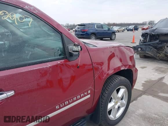 2009 Chevrolet Suburban LTZ z VIN 1GNFK36309J105434, wystawiony jako IAAI lot #42062907 z przebiegiem 132 674 mil mil oraz . Historia ofert i sprzedaży dostępna na DreamBid. Obrazek 18.