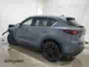 2023 Mazda CX-5 S Carbon Edition z VIN JM3KFBCM0P0292011, wystawiony jako Copart lot #71715585 z przebiegiem 30 893 mil mil oraz Szkoda całkowita • Salvage title. Historia ofert i sprzedaży dostępna na DreamBid. Obrazek 2.