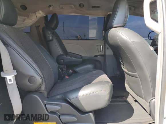 2011 Toyota Sienna SE with VIN 5TDXK3DC1BS105239, listed as a Copart auction lot 67643005 with 213,548 mi miles and Salvage title. Bid and sale history available at DreamBid. Image 11.