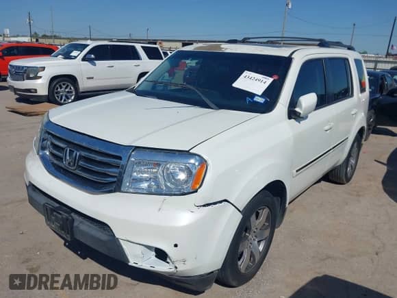 2014 Honda Pilot Touring with VIN 5FNYF3H95EB019027, listed as a IAAI auction lot 43424914 with 91,055 mi miles and . Bid and sale history available at DreamBid. Image 2.
