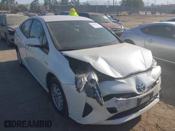 2016 Toyota Prius Four z VIN JTDKARFU7G3518197, wystawiony jako IAAI lot #43061534 z przebiegiem 138 891 mil mil oraz . Historia ofert i sprzedaży dostępna na DreamBid. Obrazek 1.