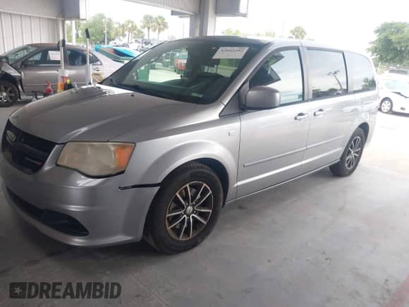 2014 Dodge Grand Caravan SE with VIN 2C4RDGBG3ER412053, listed as a IAAI auction lot 42663202 with 246,888 mi miles and . Bid and sale history available at DreamBid. Image 17.