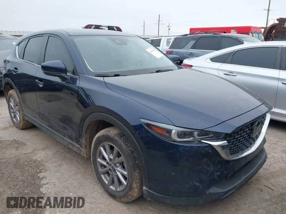 2022 Mazda CX-5 S Select z VIN JM3KFBBM2N0534666, wystawiony jako IAAI lot #43139413 z przebiegiem 102 819 mil mil oraz . Historia ofert i sprzedaży dostępna na DreamBid. Obrazek 1.