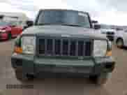 2007 Jeep Commander Sport z VIN 1J8HG48K47C527522, wystawiony jako Copart lot #71357285 z przebiegiem 193 879 mil mil oraz Szkoda całkowita • Salvage title. Historia ofert i sprzedaży dostępna na DreamBid. Obrazek 5.