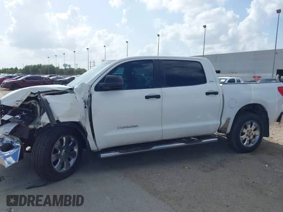 2007 Toyota Tundra SR5 z VIN 5TBET54177S454906, wystawiony jako IAAI lot #42524859 z przebiegiem 429 890 mil mil oraz . Historia ofert i sprzedaży dostępna na DreamBid. Obrazek 14.