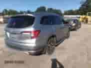 2021 Honda Pilot Touring 7-Passenger with VIN 5FNYF5H69MB000710, listed as a IAAI auction lot 43081838 with 91,899 mi miles and . Bid and sale history available at DreamBid. Image 4.