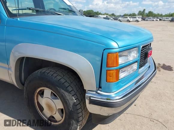 1989 GMC Sierra 1500 z VIN 1GTDK14K7KZ540666, wystawiony jako IAAI lot #42829910 z przebiegiem 180 287 mil mil oraz . Historia ofert i sprzedaży dostępna na DreamBid. Obrazek 6.
