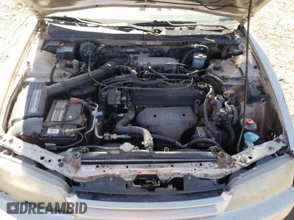 1994 Honda Accord LX z VIN 1HGCD5631RA137411, wystawiony jako Copart lot #76126484 z przebiegiem 212 681 mil mil oraz Szkoda całkowita • Salvage title. Historia ofert i sprzedaży dostępna na DreamBid. Obrazek 11.