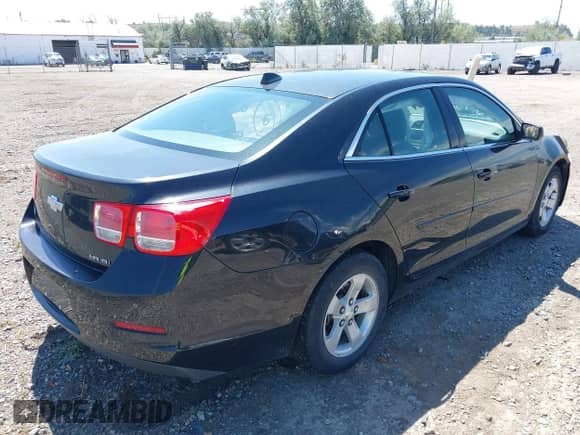 2013 Chevrolet Malibu LS with VIN 1G11B5SA5DF165779, listed as a IAAI auction lot 42907632 with 100,927 mi miles and . Bid and sale history available at DreamBid. Image 4.