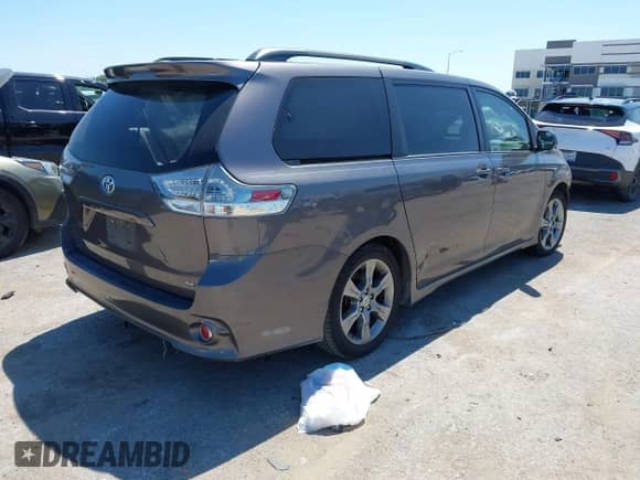 2012 Toyota Sienna SE with VIN 5TDXK3DC5CS232979, listed as a IAAI auction lot 43136504 with 198,231 mi miles and . Bid and sale history available at DreamBid. Image 4.
