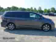 2012 Toyota Sienna SE with VIN 5TDXK3DCXCS267405, listed as a IAAI auction lot 42401101 with 134,553 mi miles and . Bid and sale history available at DreamBid. Image 13.