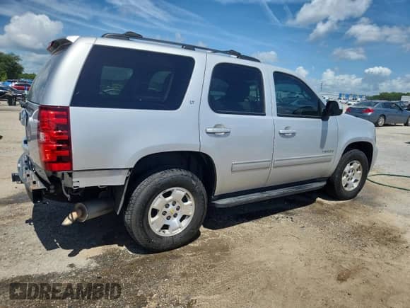 2014 Chevrolet Tahoe LT with VIN 1GNSCBE07ER135040, listed as a Copart auction lot 65328115 with 114,497 mi miles and Salvage title. Bid and sale history available at DreamBid. Image 3.