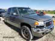 2006 GMC Sierra 1500 SLT with VIN 1GTEK19B36Z265526, listed as a Copart auction lot 59533025 with 244,622 mi miles and Salvage title. Bid and sale history available at DreamBid. Image 4.