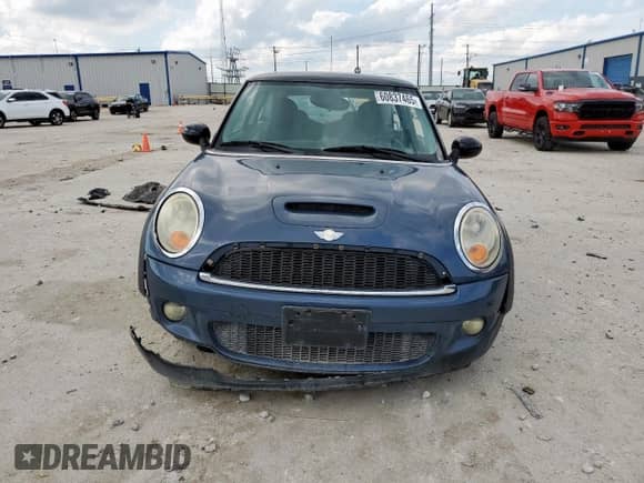2010 MINI Hardtop S with VIN WMWMF7C51ATZ69061, listed as a Copart auction lot 60837465 with 102,506 mi miles and Salvage title. Bid and sale history available at DreamBid. Image 5.