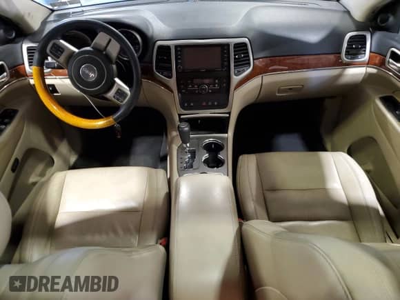 2012 Jeep Grand Cherokee Limited z VIN 1C4RJFBT5CC183896, wystawiony jako Copart lot #71478525 z przebiegiem 194 515 mil mil oraz Czysty tytuł • Clean title. Historia ofert i sprzedaży dostępna na DreamBid. Obrazek 8.