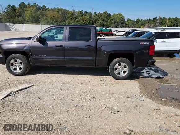 2016 Chevrolet Silverado 1500 LT z VIN 3GCUKREC1GG316239, wystawiony jako Copart lot #80915045 z przebiegiem 198 796 mil mil oraz Czysty tytuł • Clean title. Historia ofert i sprzedaży dostępna na DreamBid. Obrazek 13.