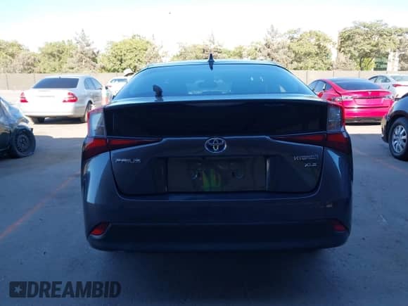 2022 Toyota Prius Nightshade with VIN JTDKAMFU4N3155017, listed as a IAAI auction lot 43013402 with 146,084 mi miles and . Bid and sale history available at DreamBid. Image 17.