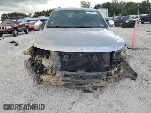 2014 Jeep Grand Cherokee Limited с VIN 1C4RJFBG2EC364041, выставлен на аукционе Copart как лот 71392015 с пробегом 121 287 миль миль и Чистый • Clean title. История ставок и продаж доступна на DreamBid. Изображение 5.